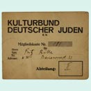 Front of a yellowed membership card filled out by hand