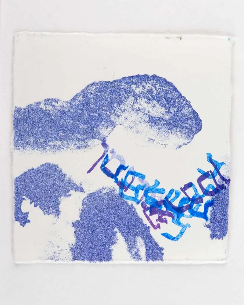 Blue print on white paper of an abstract mountainous-like landscape with layers of Hebrew letters in multicolored ink