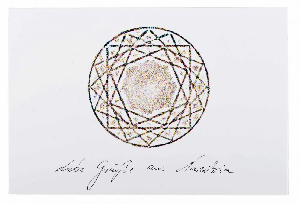 Grainy squares layered together to form a collideoscope shape, there is hand written German text at the bottom