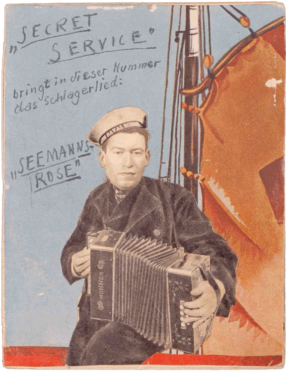 Cover of a Secret Service booklet with a collage of a sailor holding an accordion. Curt Bloch’s head has been pasted over the sailor’s. Sails are visible in the background.