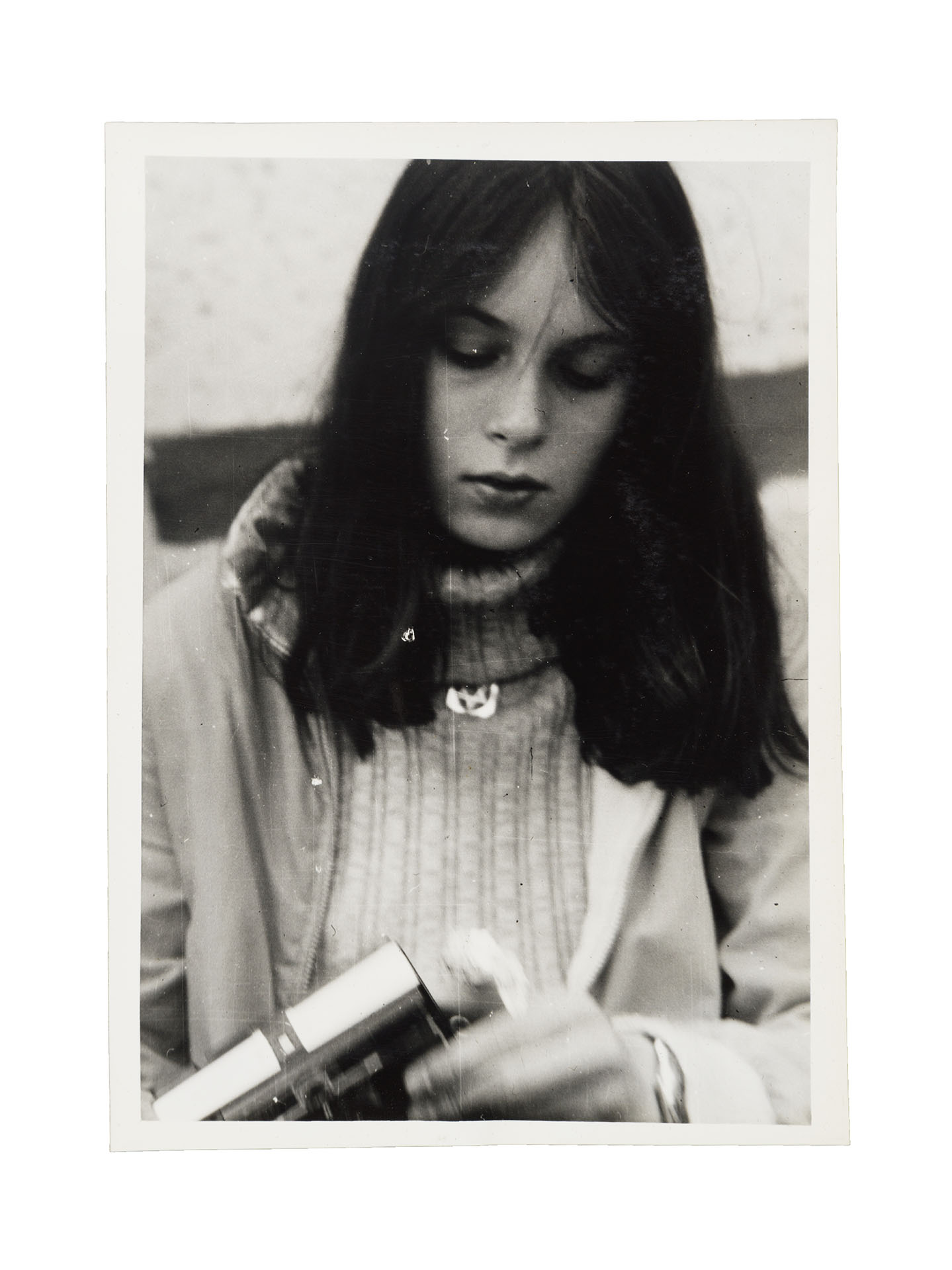 Photo of a young woman with a necklace