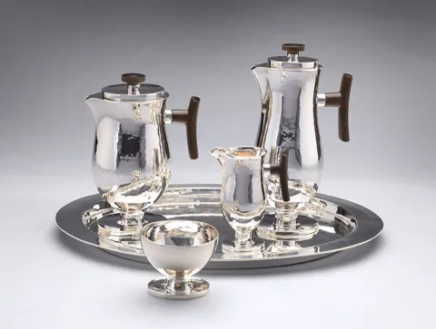 Silver coffee and tea set consisting of coffee pot, teapot, creamer, sugar bowl and tray