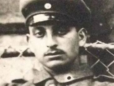 Black and white portrait of a soldier.