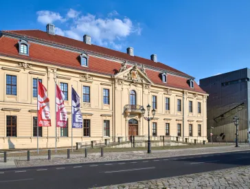 Old building facade of the Jewish Museum Berlin seen from the street.