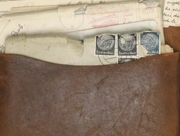 A bag filled with several letters.