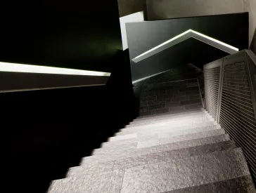 Permanent exhibition, stairs to the axes from the old building, view downwards