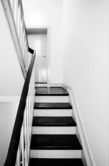 Black and white photo of a stairwell.