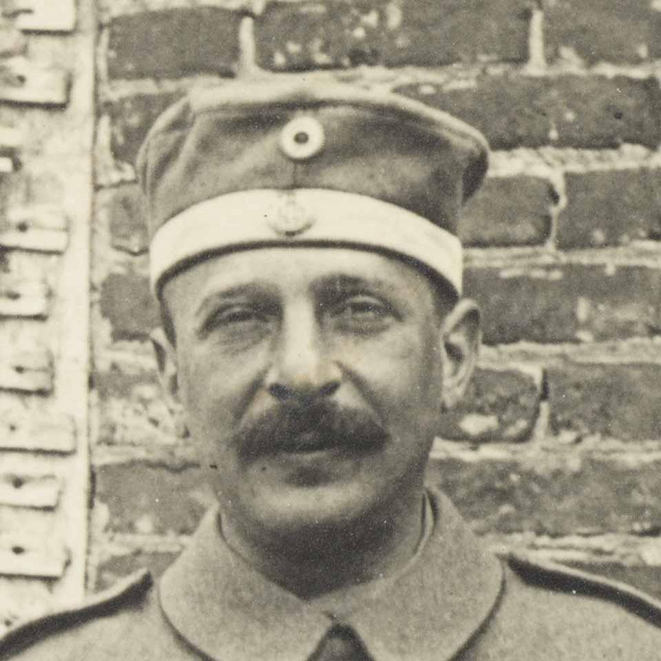 Black and white portrait of a soldier.