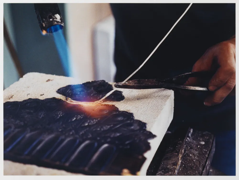 Soldering joint of two set pieces of the Hanukkah lamp.