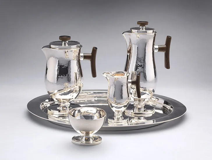 Silver coffee and tea set consisting of coffee pot, teapot, creamer, sugar bowl and tray
