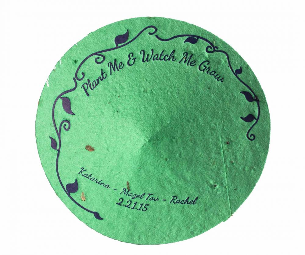 Green kippah with the words “Plant me and watch me grow - Katarina - Mazel tov - Rachel - 2-21-15”