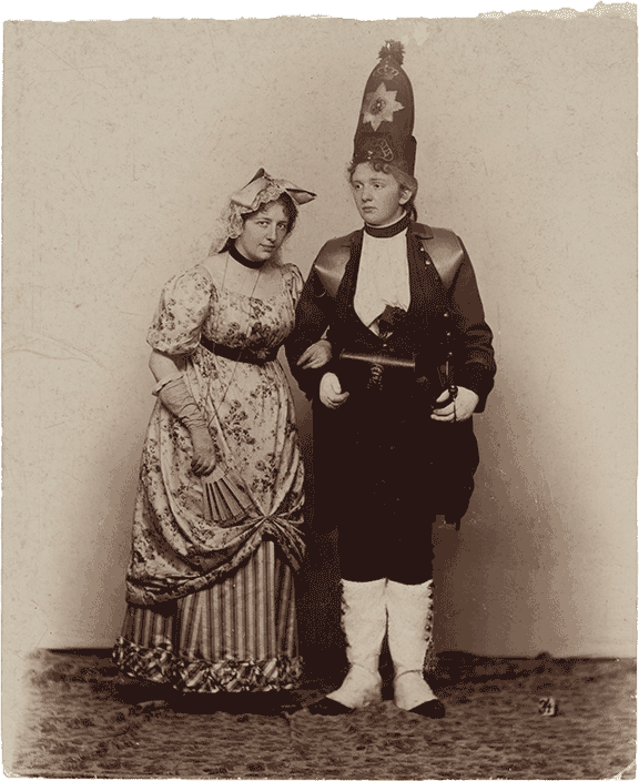 Historical black and white photograph of two women in costumes.