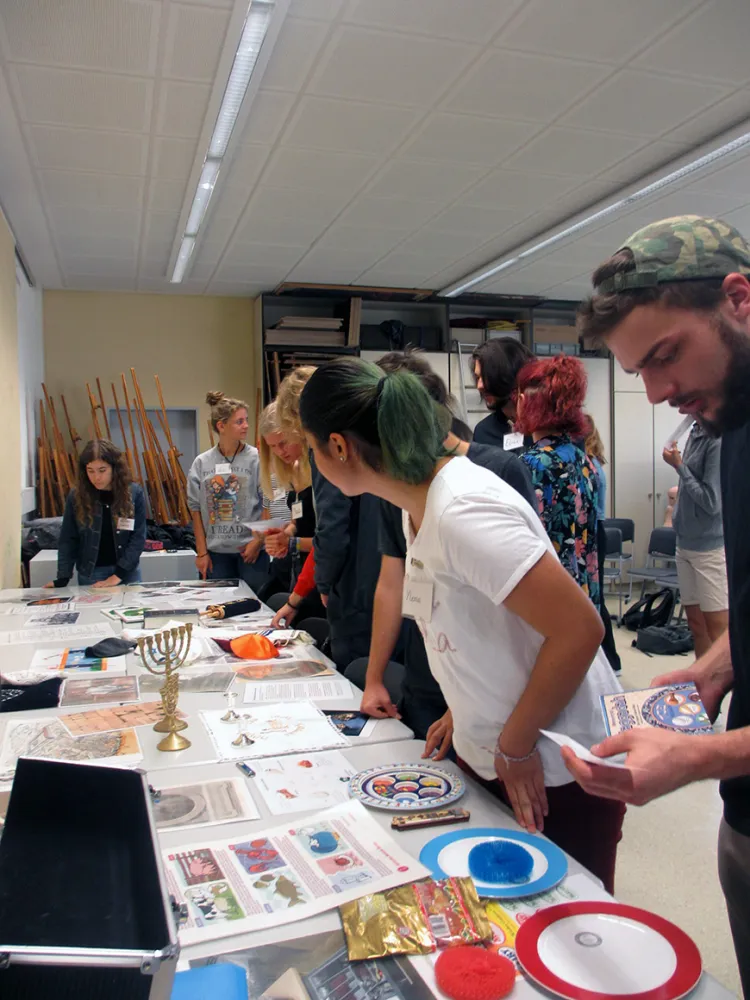 In small groups, students research the materials provided on Jewish life