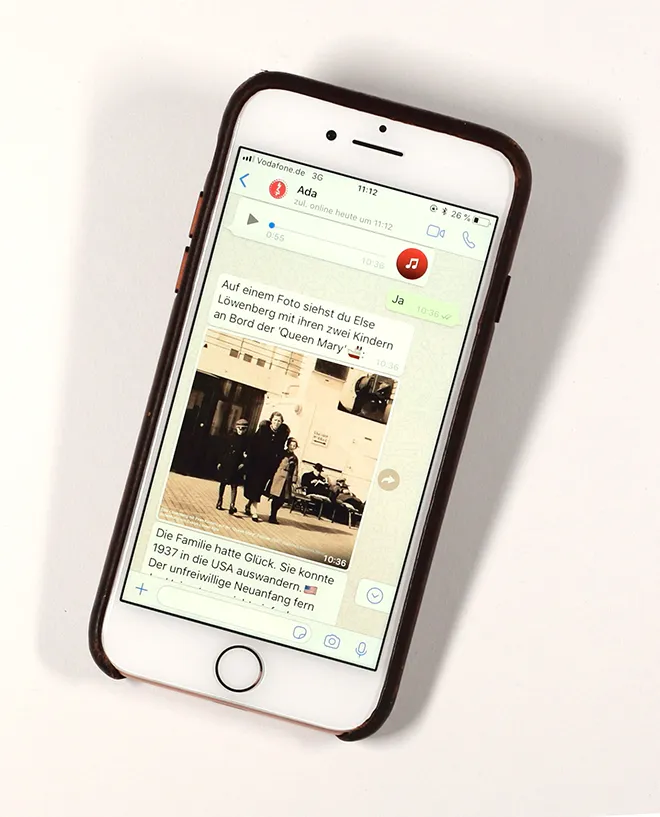 Photography: A view of a smartphone with a chat history and a photo.