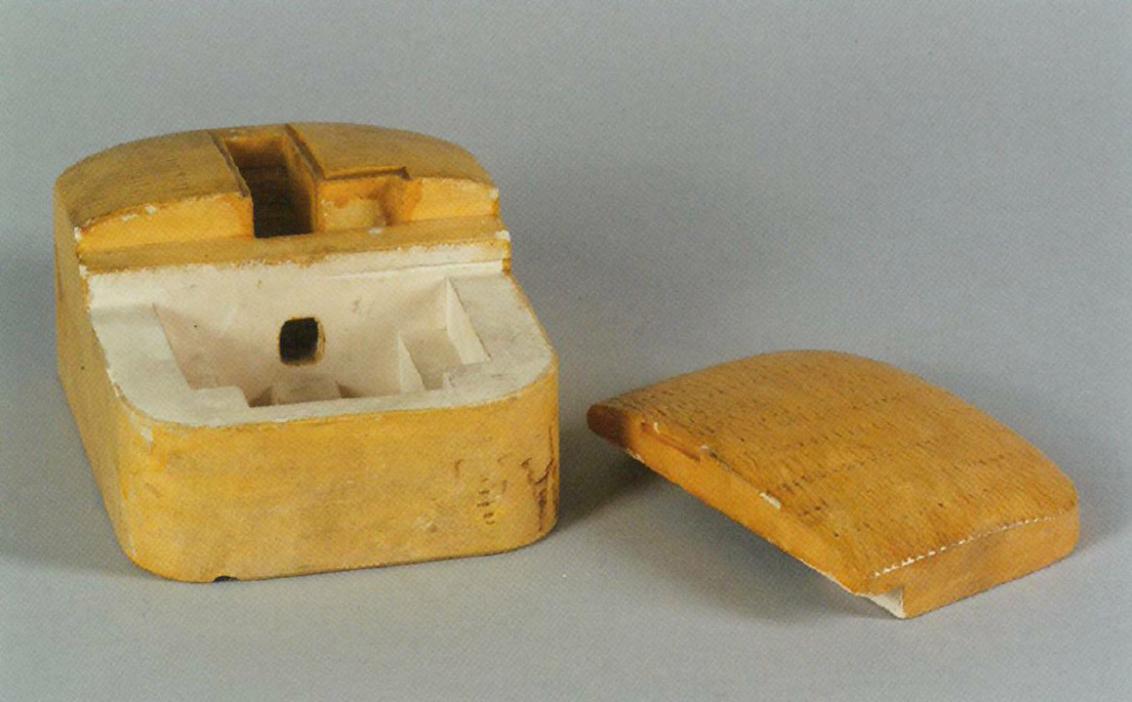 The image shows a model of a mikva from the early twentieth century.