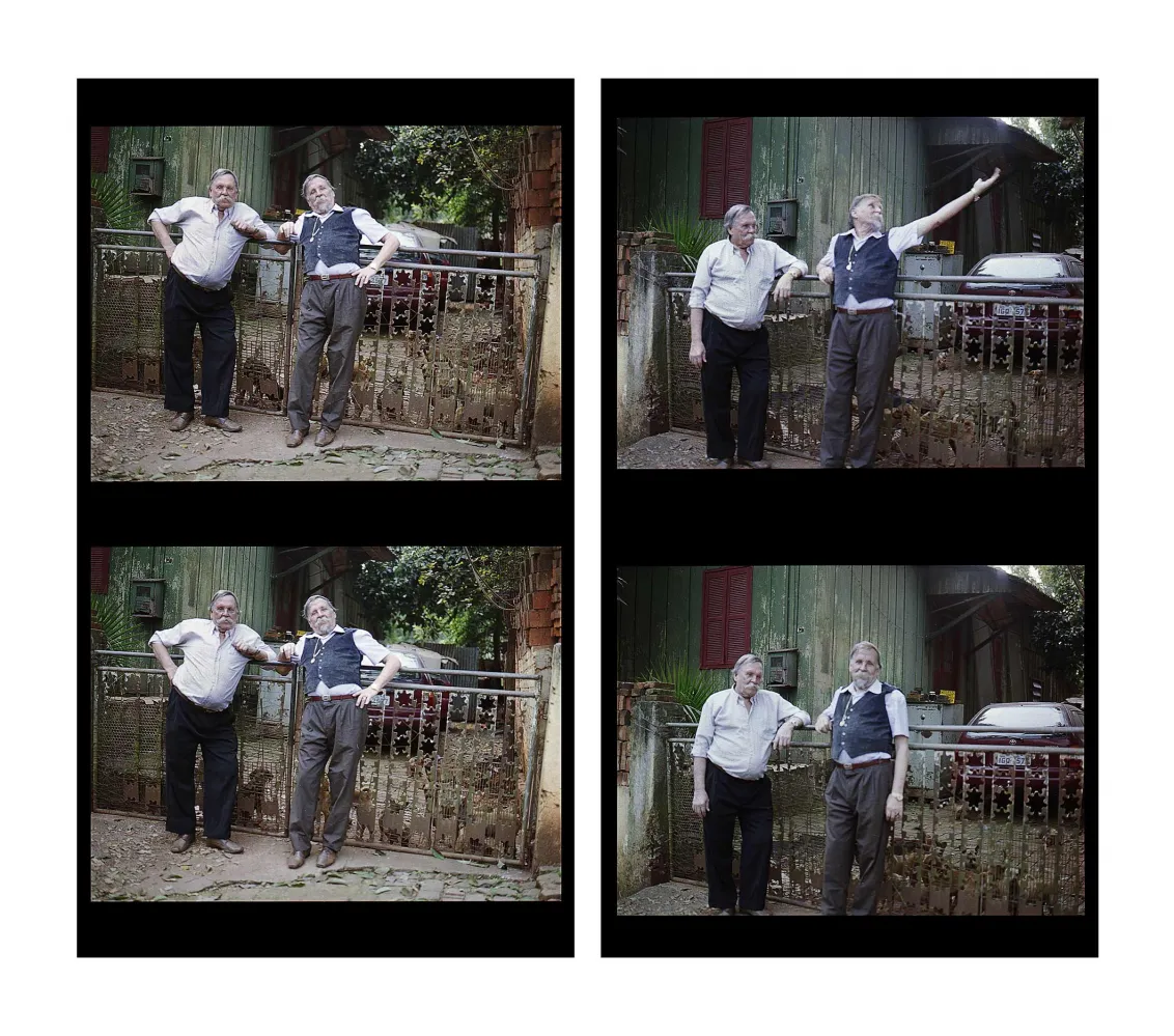A four pannel repeated black and white scene of two older men with large grey mustaches leaning against a rusting fence