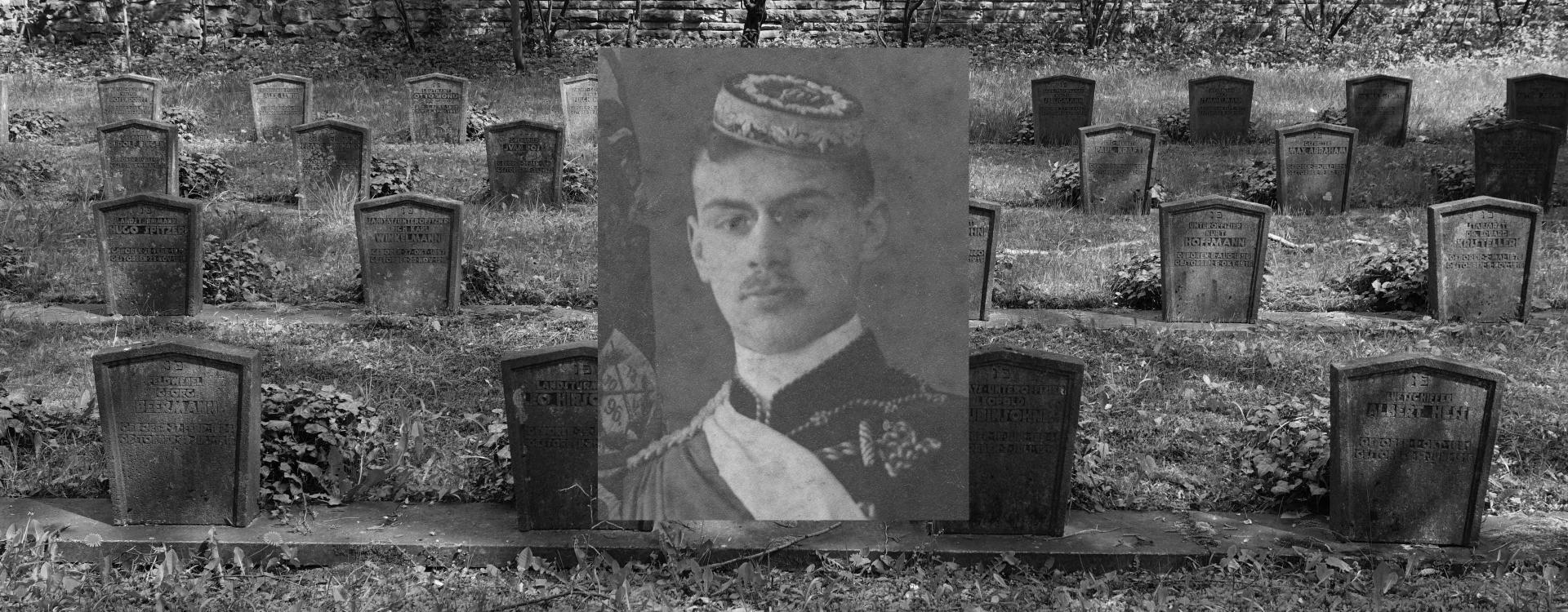 Gravestones in a cemetery, above them the portrait of a man.