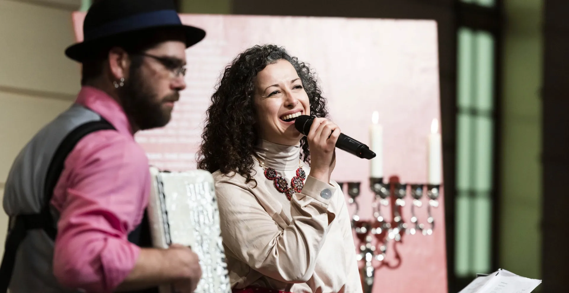 A man and a woman making music