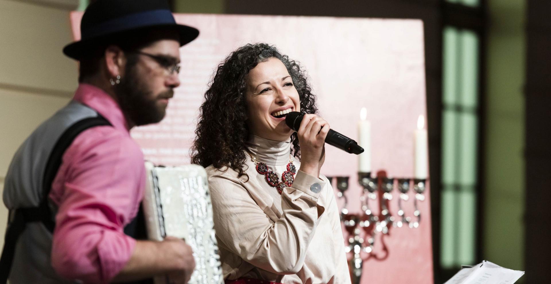 A man and a woman making music