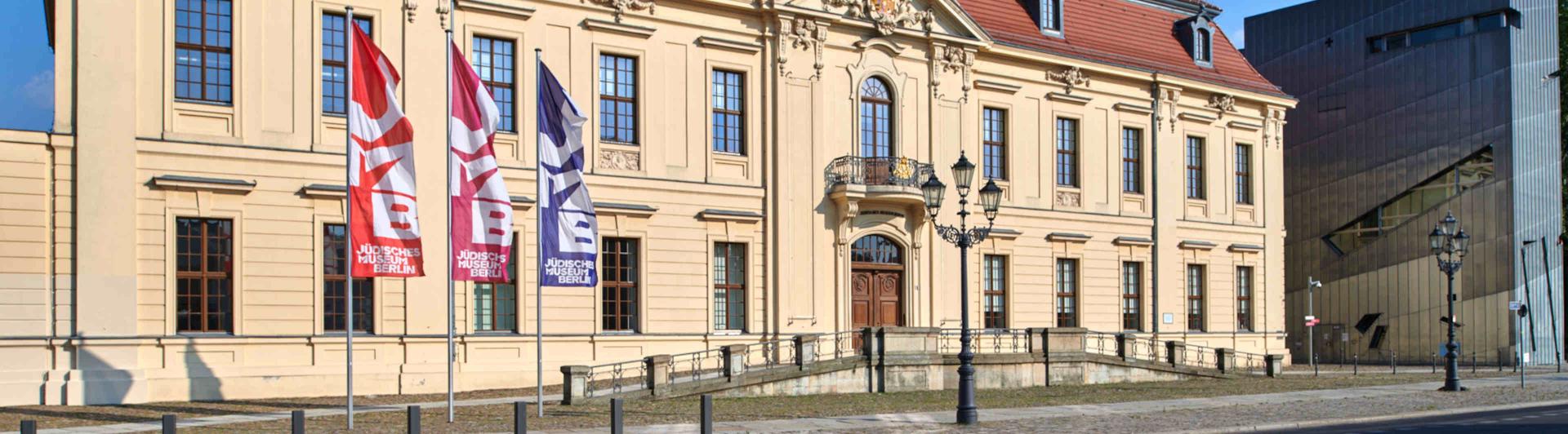 Old building facade of the Jewish Museum Berlin seen from the street.