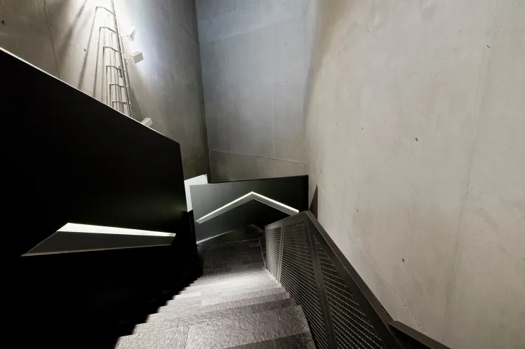 Photography: View down the stairs to the axes